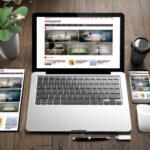 3d-rendering-devices-wooden-floor-showing-e-magazine-responsive-website_72104-3752