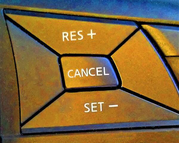 Close-up of three car steering wheel cruise control buttons—RES +, CANCEL, and SET –—designed for seamless single user operation.