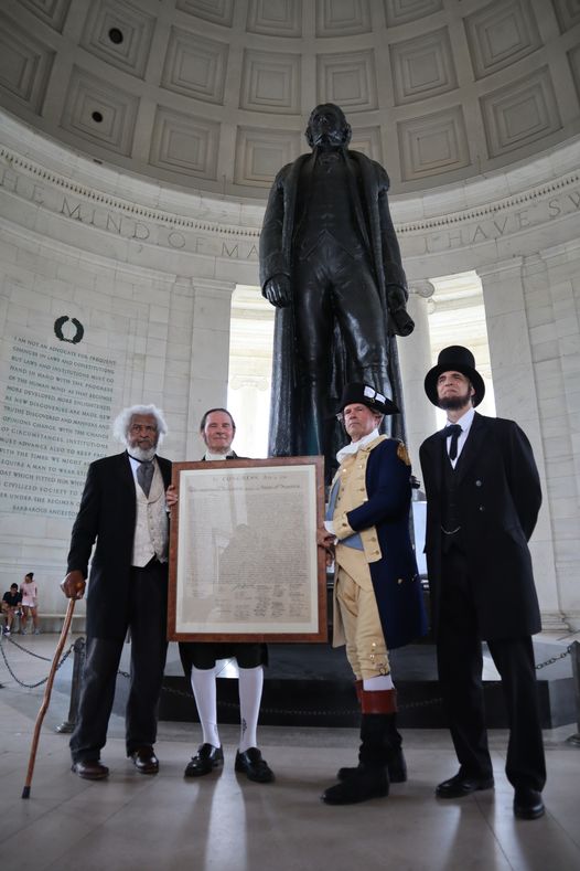 Historical figures reenactors at Jefferson Memorial.