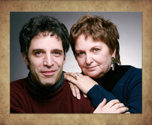 Smiling man and woman posing together.